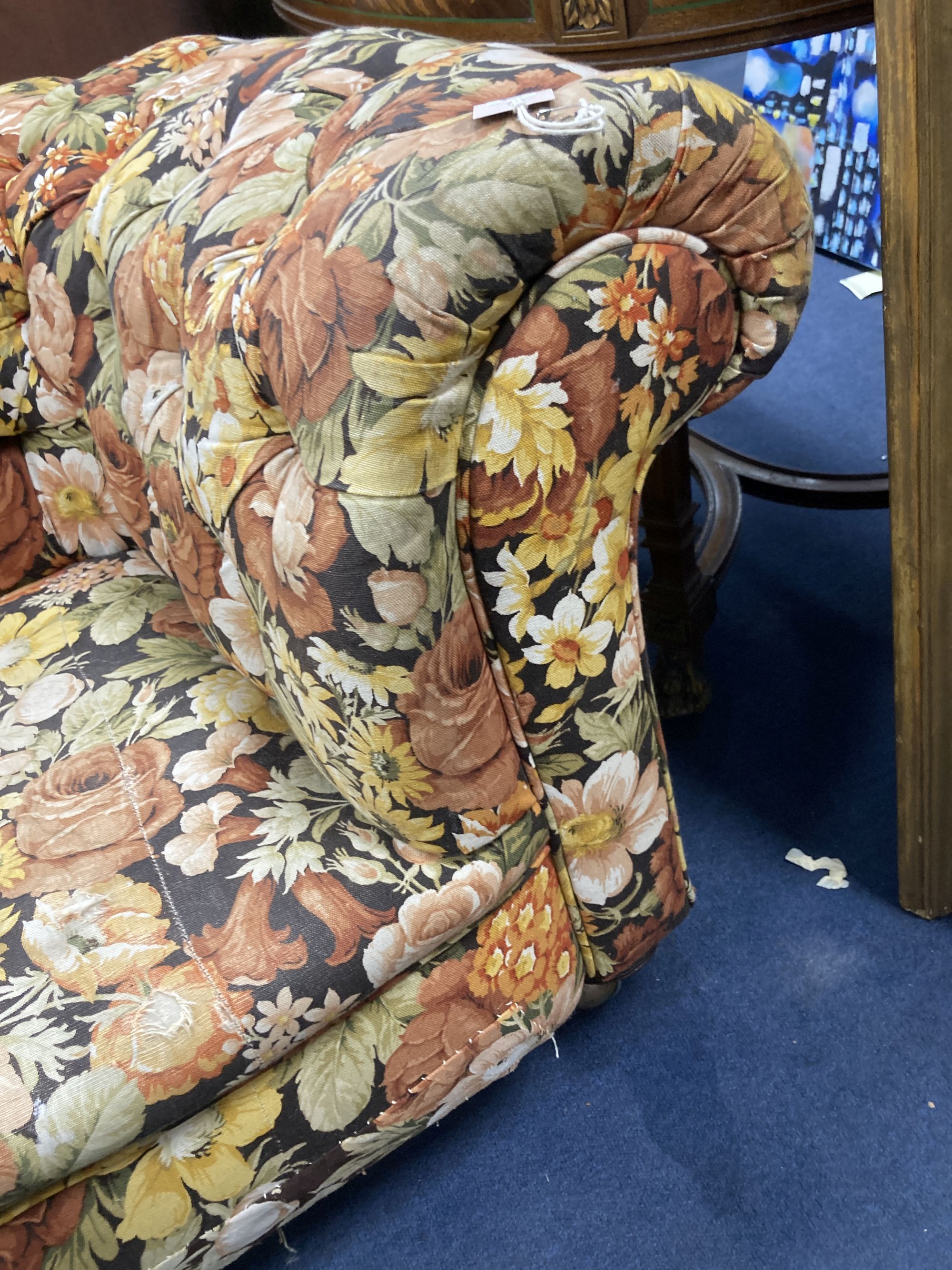 A Victorian floral upholstered Chesterfield settee, length 200cm, depth 85cm, height 68cm